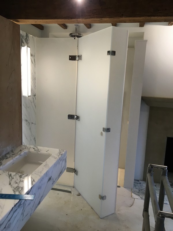 Bespoke frosted glass shower enclosure in Seven Sisters luxury bathroom